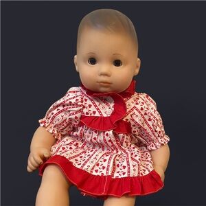 Adorable Red and Pink Baby Doll